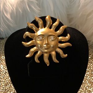 Gold Sun brooch and pendant with shiny eye stones